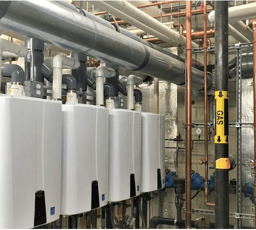 Tankless water heaters used with storage